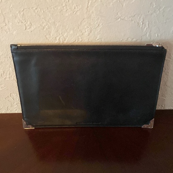 Alexander Wang Large Snakeskin Clutch 10.5”x7”x1
Excellent condition black grey